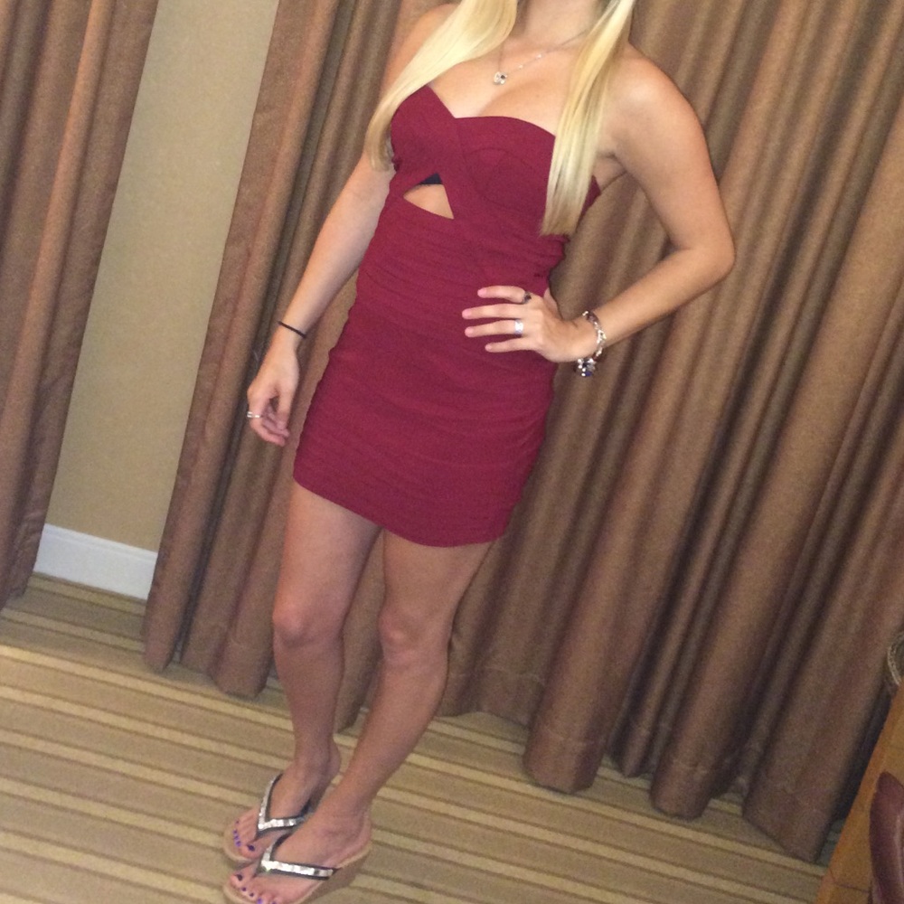 Dark red strapless club dress.
